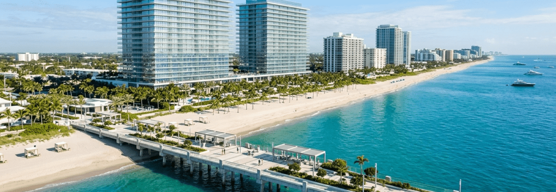 Realistic aerial view of the Pompano Beach coastline in 2026, featuring new luxury branded residences and the modern fishing pier.
